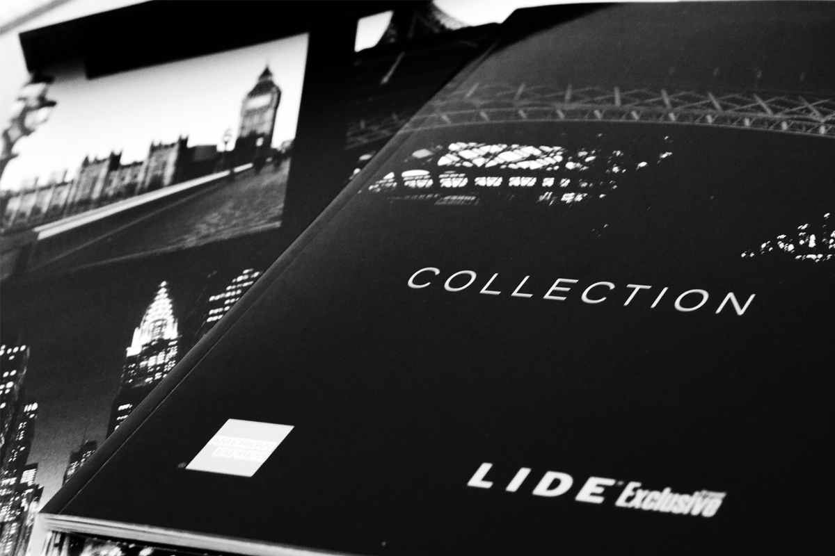 Catálogo Collection do LIDE Exclusive Travel, com capa preta e fotografia de cidade em preto e branco